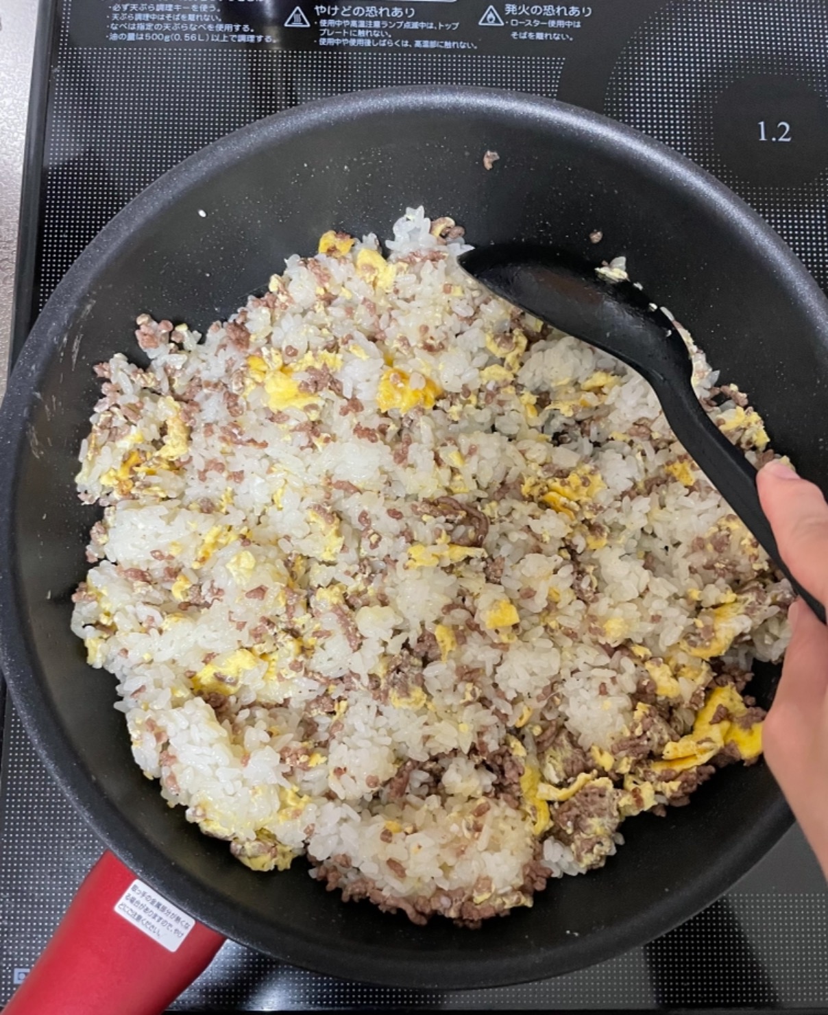 溶き卵→ごはんの順に入れ、よく炒める。